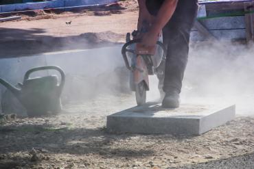 stone masons cutting